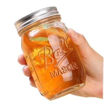 China Wholesale Custom Wide Mouth Condiment Bottle 16 Ounce Glass Ball Mason Jars With Handle And Lid In Bulk for sale