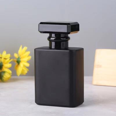 China 30ml 50ML 100ml Wholesale Fashionable Luxury Empty Frosted Black Clear Perfume Glass Spray Bottle With Cap for sale