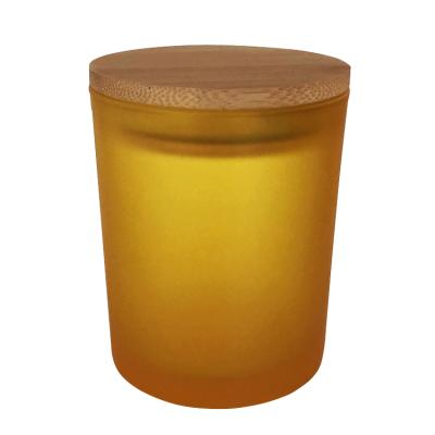 China Glass products wholesale luxury empty green matte gold black amber frosted clear glass candle container jars with lid for sale