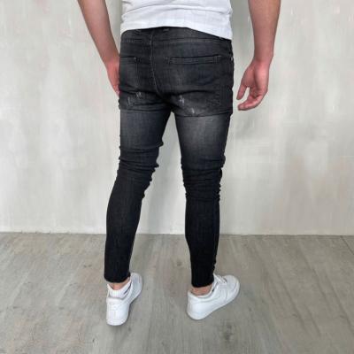 China 2022 New Men's Viable High Street Distressed Small Tapered Holes Skinny Male Cotton Jeans Feet Ripped Casual Denim Pants for sale