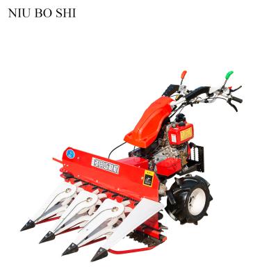 China Rice Farm Two Wheel Self Propelled Reaper Harvesting Machine Mini Paddy Reaper  Machine Rice Harvester For Sale for sale