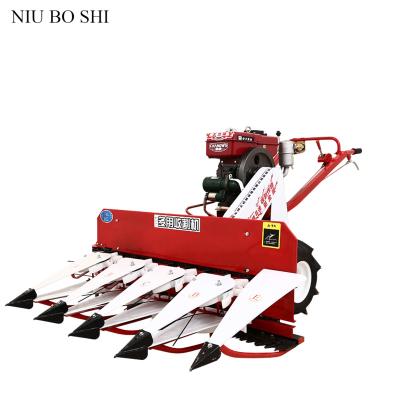 China Rice Farm Two Wheel Self Propelled Reaper Harvesting Machine Paddy Rice Harvester Binder For Sale for sale