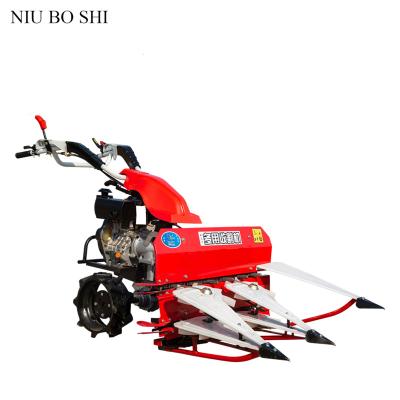 China Rice Farm Two Wheel Self Propelled Reaper Harvesting Machine Mini Paddy Reaper Machine Rice Harvester For Sale for sale