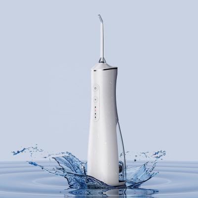 China The Best Selling RV Dental Electric Oral Irrigator With Handheld Cordless Water Flosser 3 Modes Charger for sale