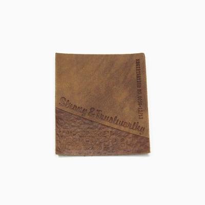 China Washable Custom Faux Leather Labels Embossed PU Leather Label for sale