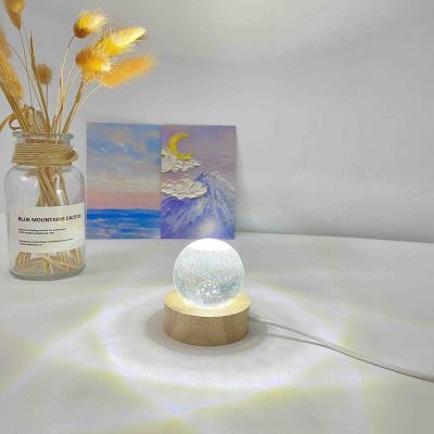 China Modern Hot Sale Usb Touch Round Life Wonderful Wooden Dome Crystal Ball Round Wooden Base for sale