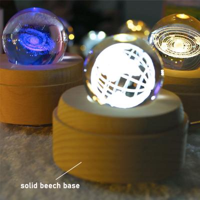 China Custom Crystal Ball Luminous Rotary Round Christmas Wooden Music Box Wooden Background Modern Decoration Gift for sale