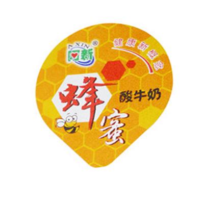 China Kingred 45mm Die Cut Lids Heat Sealing Embossing For Honey Container for sale