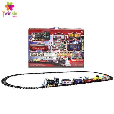 China Slot Toy Carry Train Set Music Light Christmas Electric Toy With Smoke Track Toy Train for sale