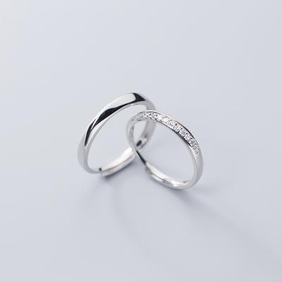 China TRENDY S925 silver lovers ring men and women shape single row diamond hand jewelry wave lovers ring for sale