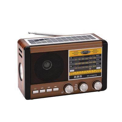 China Torch light rs-658bts AM Fm switch 3 band radio with torch, charging light, all-in-one solar panel, usb, tf blueteeth mp3 player for sale