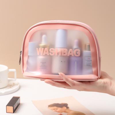 China Lady Custom Logo Shell Shape PU PVC Wash Makeup Travel Waterproof Cosmetic Clear Bag for sale