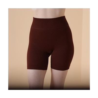 China Spring/Summer New Solid Color Breathable Naked Stretch Sports Tight Pants Yoga Pants for sale