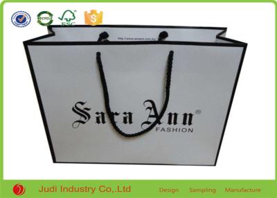 China Handcraft Promotional Paper Bags 21 X 25 X 10 Cm Hot Stamping Logo With Green Ribbon for sale