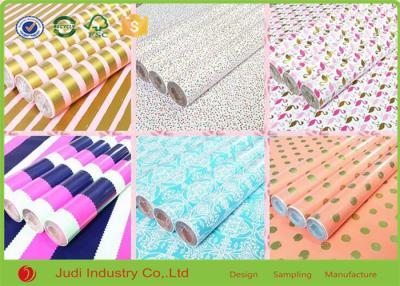 China Gift Packaging Roll Wrapping Paper Fancy Design Hot Stamping Glitter Wrapping Paper for sale