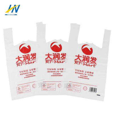 China 2022 New Recyclable Fruit Handle Degradable Pla Pbat Supermarket Restaurant Plain Takeaway Roll Customized Printed Mylar Food Vest Bag for sale