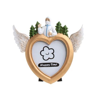 China Environmentally friendly unique love day unique design angle resin Angel Wing photo frame picture frame heart design home decoration for sale