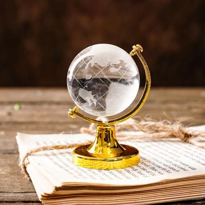 China A Silver/Gold Color Mental Holder Balances Mini Artificial Crystal Glass Frosted Round Earth Globe Delicate World Globe Paperweight Handy Desk Decorations for sale