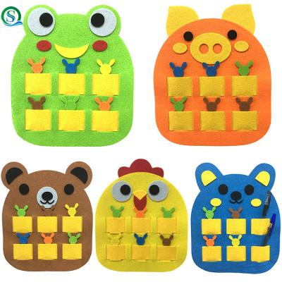 China Eco-friendly Environmental Toys For Kids Felt Handmade Creative Jigsaw Cartoon Morning DIY Teaching Bag for sale