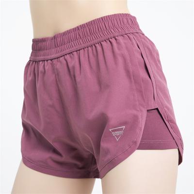 China High Quality QUICK DRY Summer Elastic Waist Logo Yoga Shorts miqi Custom Made Clothing Customize Shorts Women With Zipper Pocket for sale