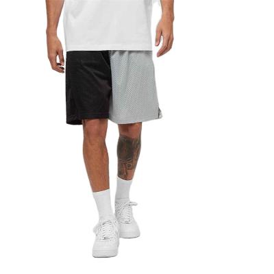 China Anti-wrinkle sports polyester summer fashion high quality double layered contrast color men custom basketball mesh shorts with pockets for sale