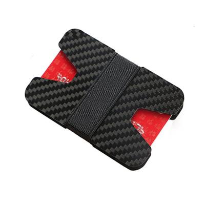 China Front Pocket Wallets Slim Lightweight Minimalist RFID Blocking Carbon Fiber Credit Card Holder Money Clip with Elastic Band for sale