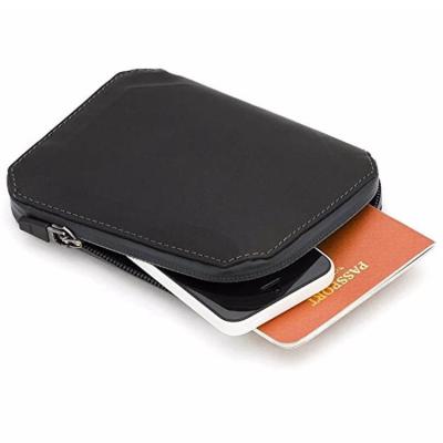 China RFID Blocking Universal Genuine Leather RFID Blocking Zipper Coin Slot Travel Passport Holder Wallet Waterproof Zipper Wrist Wallet for sale