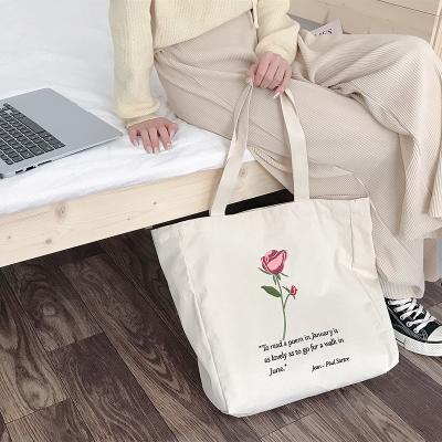 China Jean-Paul Sartre Rose Embroidery Women Canvas Shoulder Bag Cotton Fabric Handbag Tote Books Bags For College Girls Waterproof for sale