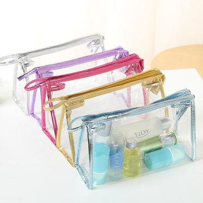 China Lady Customized Clear PVC Cosmetic Bag Handle Storage Plastic Packaging Bag For Waterproof Makeup Zipper Pouch for sale