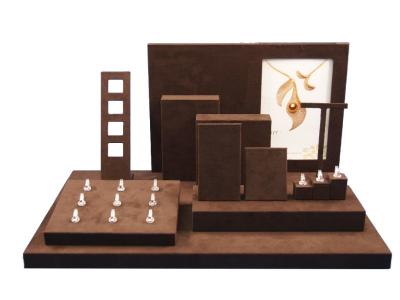 China Custom Handmade Brown Leatherette Jewelry Display Set MDF Jewellery Showcase Stand for sale