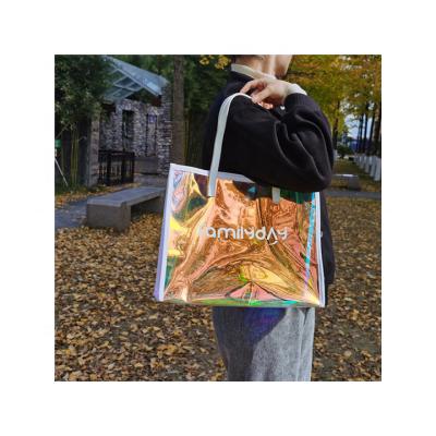 China Durable Transparent Tote Bag Custom Logo Holographic Rainbow Laser PVC Shoulder Tote Bag for sale