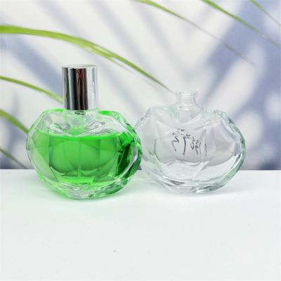 China 55ml Irregular Shape Cosmetic Transparent Perfume Empty Glass Bottle for sale