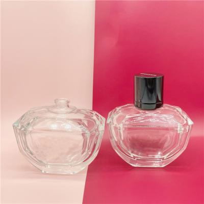 China Cosmetic Glossy Unique Shape 100ml Custom Glass Perfume Bottles For Cosmetic Beauty for sale