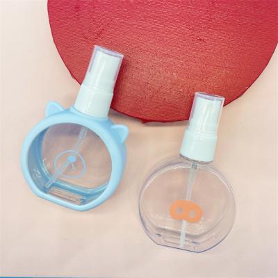 China Mini 55ml Cosmetic Pig Perfume Spray Pouch Plastic Refillable Bottles With Silicone Cover for sale