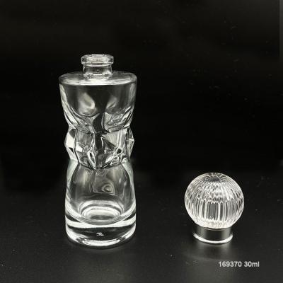 China Unique 30ml Clear Cosmetic Men Shape Glass Perfume Bottles With Crystal Cap for sale