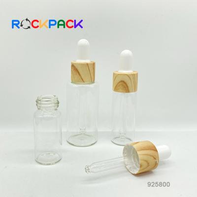 China 5ml 10ml Essential Oil Cosmetic Empty Glass Dropper Bottle Packaging Wooden Print for sale