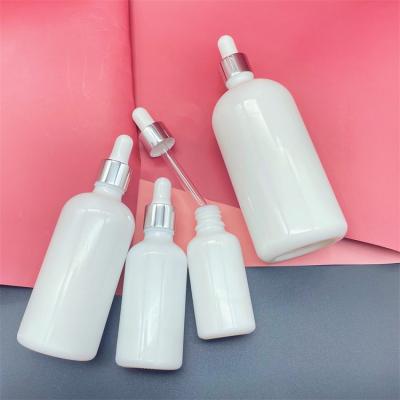 China 10ml 15ml 30ml 50ml 100ml 200ml china cosmetic essential oil cosmetic white bottle with dropper for sale