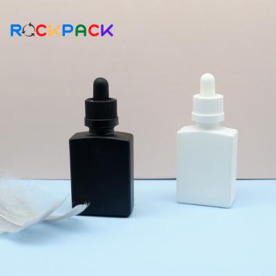 China Personal Care 30ml Rectangle Essential Oil Glass Bottles With Anti Fill Dropper Cap for sale