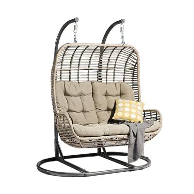 China Cheap and high quality outdoor rattan double seat modern wicker egg swing hanging chair with metal bracket swing chair for sale