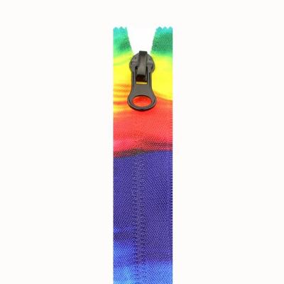 China Custom No.7 Colored Logo Zipper Rainbow Nylon Concealment Luminous Zipper Customized for sale