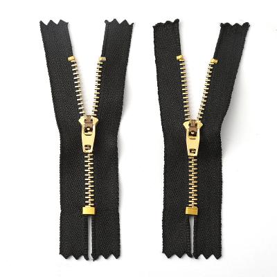 China 4YG 4# Brass Zipper 4YG Spring Lock Slider Metal Zipper For Jeans for sale