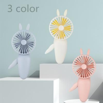 China Indoor and outdoor can be used mini manual pressure fan portable fan summer cute rabbit shape with outdoor led light handheld manual fan for sale