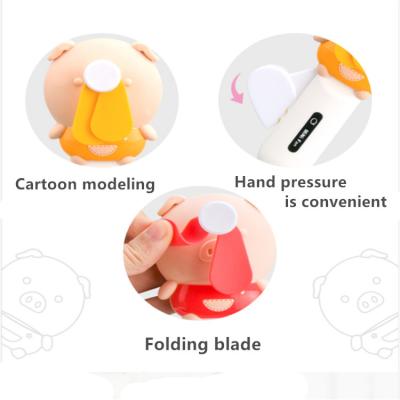 China Lovely hand fan hand and hand fan cartoon pig shape hand pressure small colorful portable fan safe and soft material for kids for sale