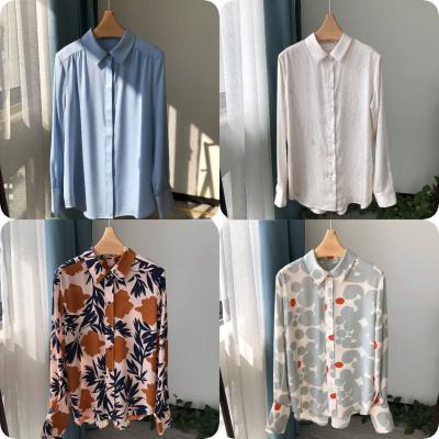 China Anti-pilling 2023 wholesale long loose shirts fashion solid color casual women's shirts to shirts for sale