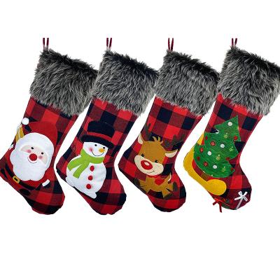 China Black Red Plaid Fabric Plush Faux Fur Cuff Christmas Stockings with Santa Snowman Reindeer Christmas Tree Pattern for sale