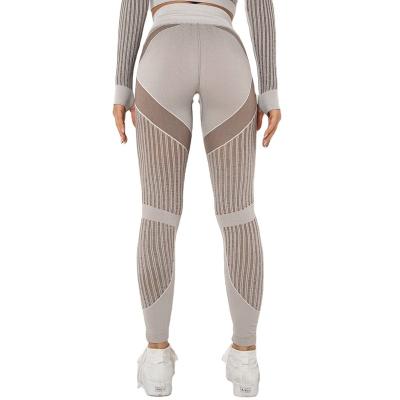 China 2022 Antibacterial Seamless knitting sexy stripe sweat wicking yoga pants running fitness pants women yoga leggings for sale