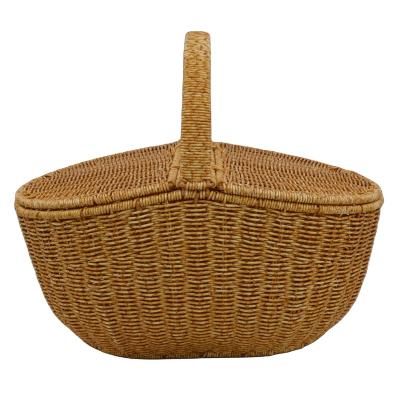 China Bathroom Hot Selling Hand Woven Rattan Picnic Basket  Shopping Vintage Basket With Lid And Handle For Camping Or Shopping for sale