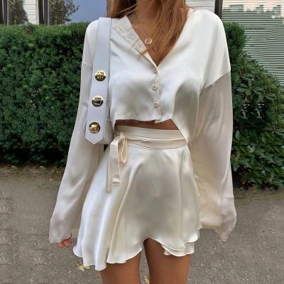 China Women's Anti-Static White Two Piece Set Lantern Satin 2 Long Sleeves Crop Tops Sexy Mini Tennis Sports Skirts High Waist Cardigan for sale