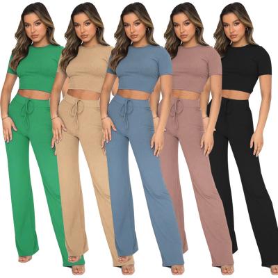 China New Fashionable Breathable Wholesale 2 Piece Set Women Casual Wear Solid Color Slimming Pocket Sports Two Piece Suit for sale