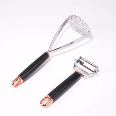 China 2pcs SUS304 Viable Unfolding Potato Masher Fruit Vegetable Tools Accessories Potato Crusher and Peeler for sale